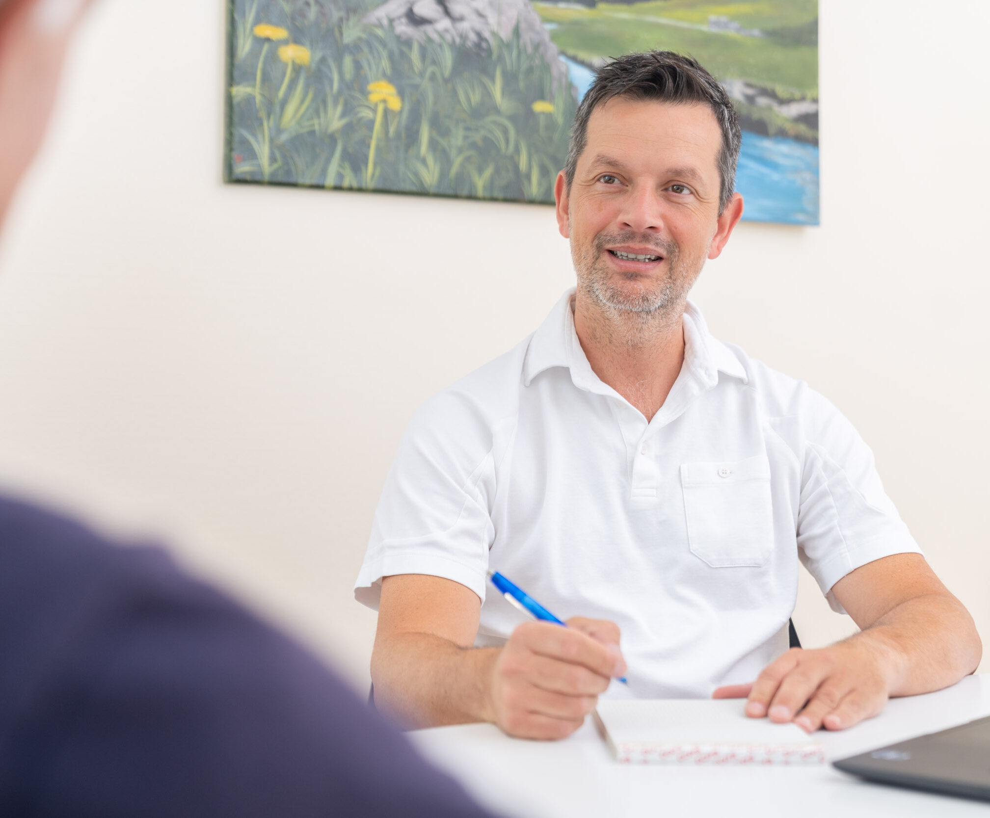 Arzt im Gespräch mit Patient