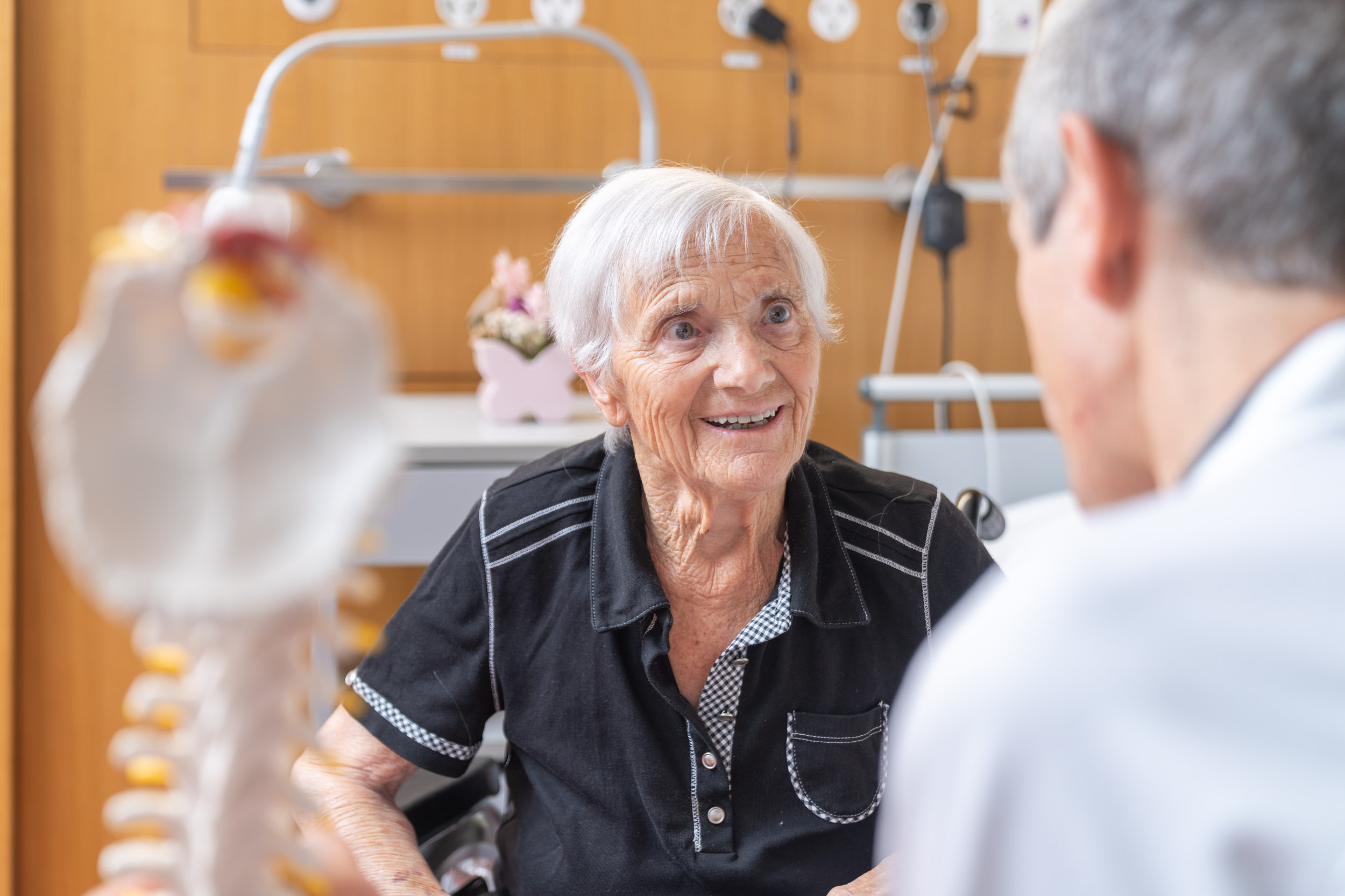 Patient im Gespräch mit Arzt