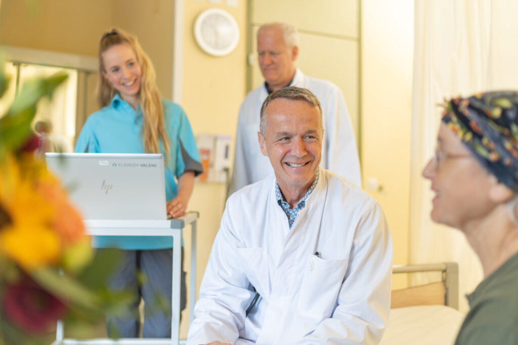 Arzt mit Gespräch mit Patientin